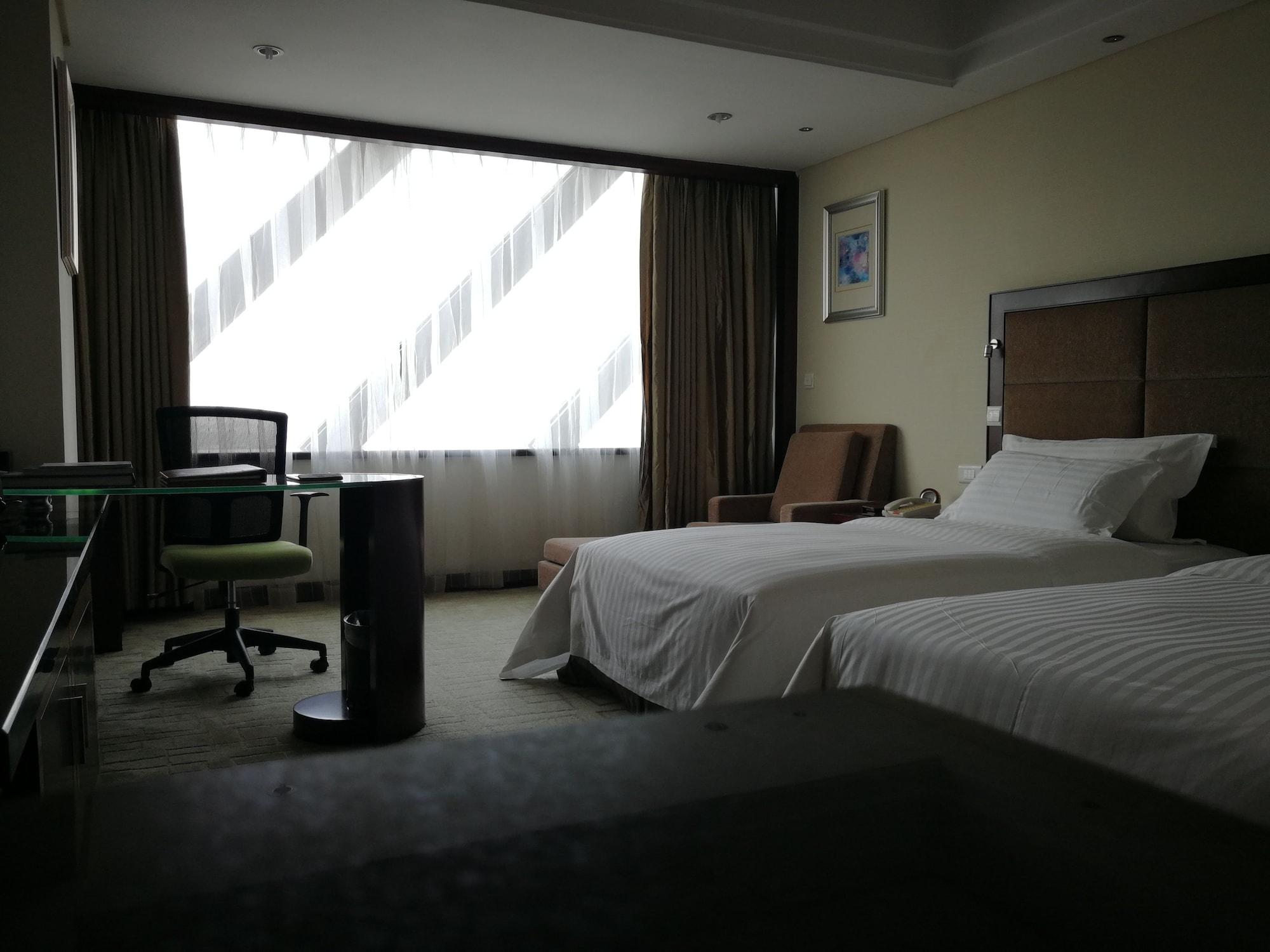 Daysun International Hotel Canton Extérieur photo